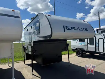 Palomino Real-Lite truck camper HS 1801 highlights: U-Shaped Dinette Round Table Charging Port Barre...