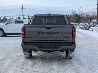 The 2026 Ram 1500 Sport stands out in Granite Crystal Metallic, combining bold styling with a refine... (image 4)