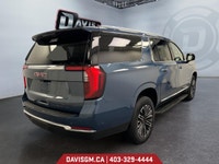 The 2025 GMC Yukon XL Elevation 4WD commands attention with bold styling, extended cargo versatility... (image 4)