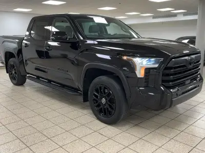 Introducing the 2024 Toyota Tundra LIMITED, a robust and refined pickup styled in an exquisite 0218...