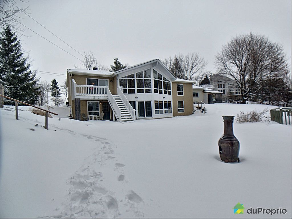 $1,600,000 - Bungalow for sale in St-Placide — photo 1