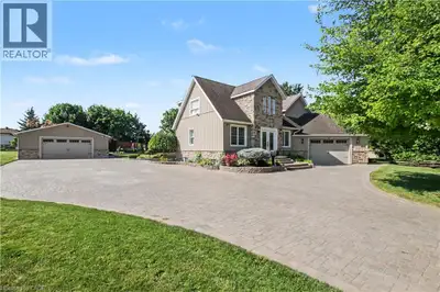 A rare opportunity where luxury, privacy, versatility and convenience meet! Set on a private half-ac...