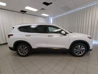 This 2020 Hyundai Santa Fe Luxury is a well-equipped midsize SUV that blends comfort, confidence, an... (image 8)