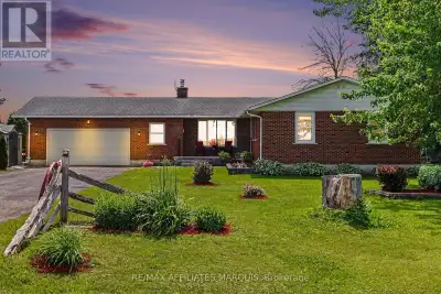 Welcome to this well-maintained all-brick 3+1 bedroom, 2-bathroom bungalow situated on a private, be...