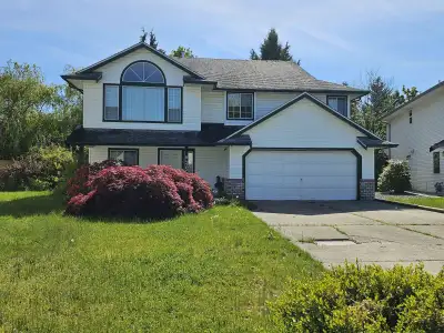 Rare Find on a Quiet Cul-de-Sac! This warm and welcoming 5-bedroom home sits on an almost 1/4 acre l...