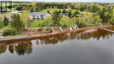 An amazing executive waterfront home with a lower level waterfront 4+star 3 bedroom air bb rental. A...