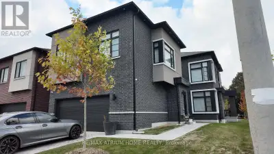 Rare opportunity to own an exceptional 2-year-old Madison Group-built home featuring two fully indep...