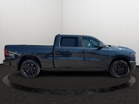 This 2026 RAM 1500 SPORT CREW CAB 4X4 has the following options Cloth/Vinyl Bucket Seats, Remote Sta... (image 5)