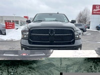 This striking 2023 Ram 1500 Classic SLT Crew Cab Pickup in Diamond Black Crystal Pearl with a Diesel... (image 1)