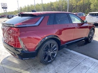 The 2026 Cadillac LYRIQ Signature Sport, finished in Radiant Red Tintcoat with a refined Oxford Ston... (image 8)