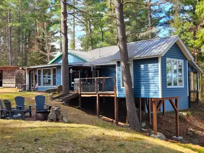 WATERFRONT HOME NESTLED ON THE BEAUTIFUL PRIVATE SHORES OF LAKE TALON. THIS GETAWAY CONSISTS OF A TW...