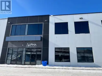 Newer industrial unit at prime location with many permitted uses. 24 foot clear height with truck le...