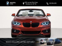 Ce superbe BMW 230i xDrive Cabriolet d'occasion allie le plaisir de la conduite ? ciel ouvert aux pe... (image 1)