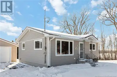 This immaculate bungalow sits on a breathtaking 0.98-acre lot, offering a rare combination of space,...