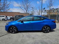 Buckle up, because this 2023 Nissan Versa SR CVT in Electric Blue Metallic isnt just a carits your t... (image 2)