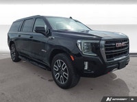 Experience the premium capability and rugged refinement of the 2023 GMC Yukon XL AT4. This used full... (image 7)