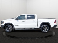 This Ram 1500 has a powerful Intercooled *Turbo Diesel* V-6 3.0 L/182 engine powering this Automatic... (image 1)