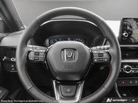 Experience the all-new 2026 Honda CR-V Hybrid Touring in a sophisticated Silver finish. This all-whe... (image 9)