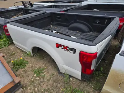 2023 Ford long box single wheel truck box, was off of a lariat ford