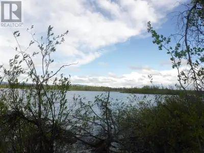 Anahim Lake waterfront property. 32.6 acres, highway access, with great building potentials. This ar...