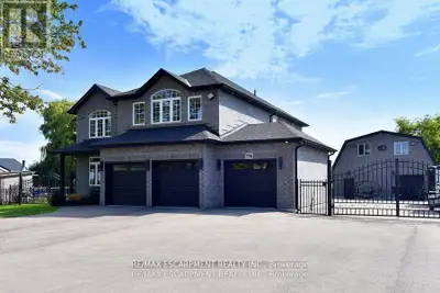 LUXURY HOME, IN-LAW SUITE, 3 CAR GARAGE + ACCESSORY BUILDING WITH WORKSHOP & APARTMENT - all on one...