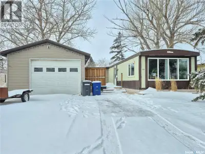 Welcome to this affordable Weyburn home with serious garage appeal! The oversized garage is fully in...