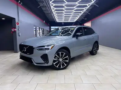 The 2024 Volvo XC60 B5 AWD Plus Dark Theme in a stunning blue finish is engineered for those who dem...