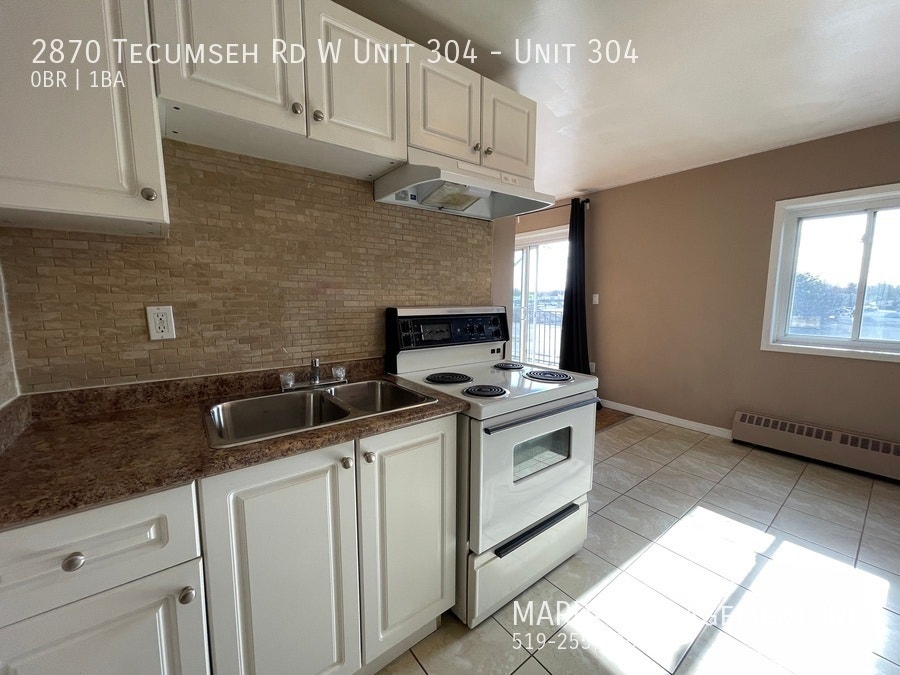 SPACIOUS BACHELOR UNIT NEAR HURON CHURCH! + Utilities 5