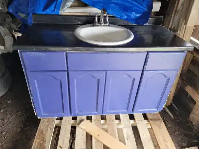 Bathroom cabinet with moen taps and sink, View more
