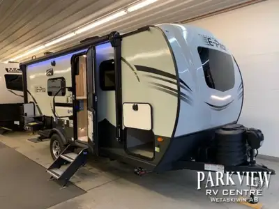 Reduced!! Queen island bed! Large bathroom! Easy to tow off grid travel trailer! Options: -2x6volt b...