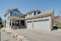 Custom Built in Burlington's Prestigious Roseland!