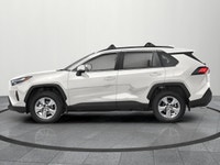 Experience the 2025 Toyota RAV4 Hybrid XLE AWD in pristine white, a vehicle designed to handle with... (image 1)