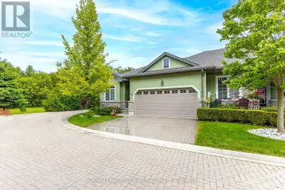 MLS® #X8404906 A DEFINITIVE BEST LOCATION FOR THIS PREMIUM END-UNIT AT OAKWOOD LINKS IN GRAND BEND!...