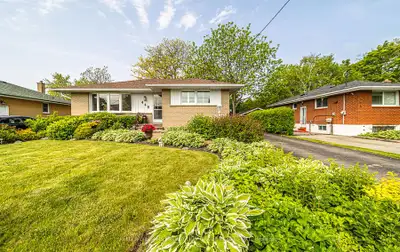 Welcome to this charming 3+1 bedroom, 2-bathroom brick bungalow located in the highly desirable McLa...