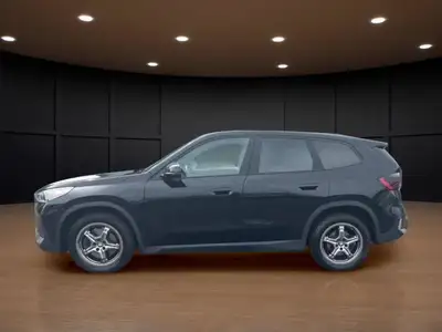 Experience the luxury of driving a black 2023 BMW X1 xDrive28i Sports Activity Vehicle with its comp...