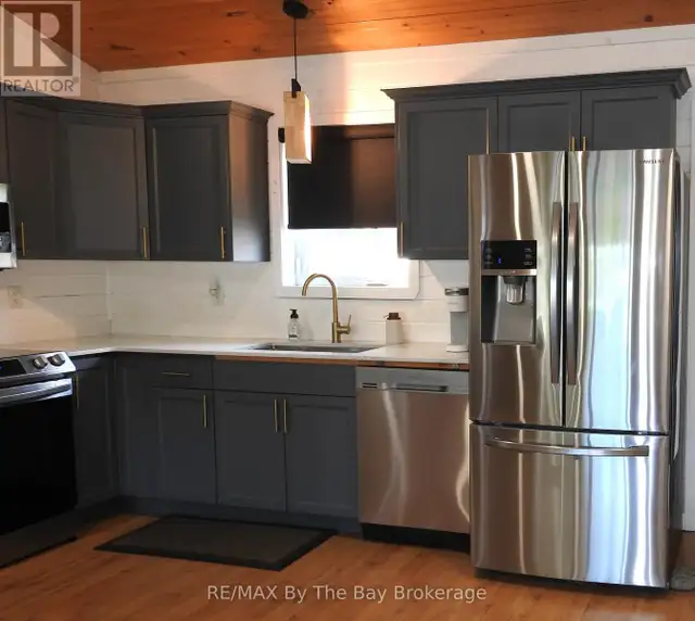 11 CABIN CRESCENT Wasaga Beach, Ontario in Houses for Sale in Oakville / Halton Region - Image 7