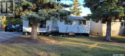 Charming Original 4 Bedroom Bungalow-steps away from the Elementary School, Large Yard with Garden a...