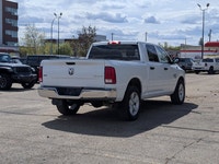 This pre-owned 2023 Ram 1500 Classic SLT Crew Cab is finished in Bright White with a clean Black and... (image 6)