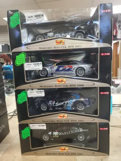 Assorted diecast cars maisto, nascar, west coast choppers, and dub city new in package prices vary....