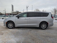 The 2026 Chrysler Grand Caravan SXT in Silver Mist with a Black interior combines versatility, comfo... (image 2)