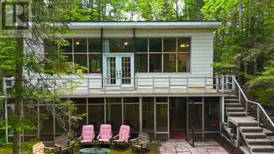 Wake up and walk to the water. This charming 2 bedroom, 2 bathroom home is nestled just steps from W...