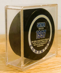 Vintage Sather Edmonton Hall of Fame Encased Puck