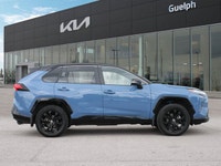 The highly anticipated 2025 Toyota RAV4 Hybrid XSE, a striking light blue Sport Utility with a sophi... (image 6)
