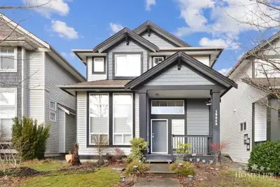 Spacious 3 Bedroom Home with Finished Basement, Double Garage and Separate Entry in Willoughby, Lang...