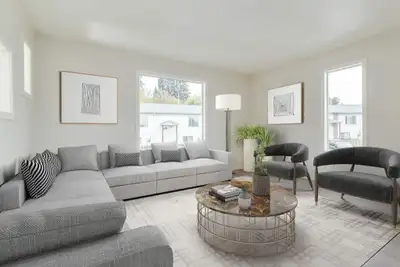 Amenities: In-suite Laundry • City Views • Affordable Parking Suite & Building: Three-bedroom townho...