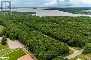 Treed building lot situated in Rural Tiny, less than a 10 minute drive to town/amenities. Build your...