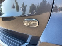 This Jeep Grand Cherokee has a dependable Regular Unleaded V-8 5.7 L/345 engine powering this Automa... (image 9)