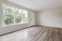 Amenities: In-suite Laundry • Private Yard • Spacious Rooms Suite & Building: Spacious two-bedroom,... (image 8)