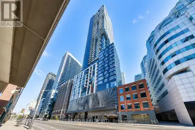 Stunning 1+Den Suite at Noir by Menkes! This bright and spacious 574 sq. ft. unit features a functio...