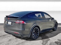 The 2017 Tesla Model X includes a power liftgate, heated front seats, and a navigation system. It of... (image 4)